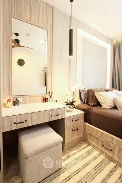 Luxurious bedroom with elegant vanity and cozy lighting