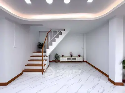 Modern minimalist interior with elegant staircase and sleek flooring