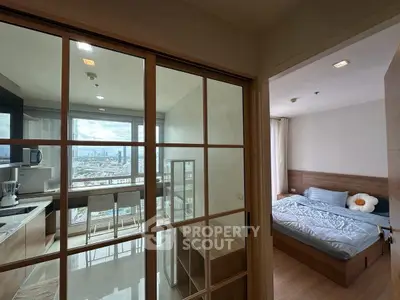 Modern apartment with stunning city view and cozy bedroom