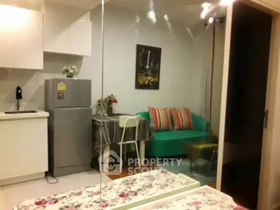 Cozy studio apartment with modern kitchen and stylish living area