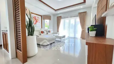 Spacious modern living room with elegant decor and natural light