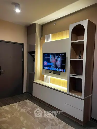 Modern living room with stylish TV unit and ambient lighting
