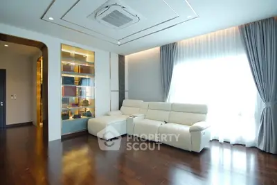 Spacious modern living room with elegant decor and natural light