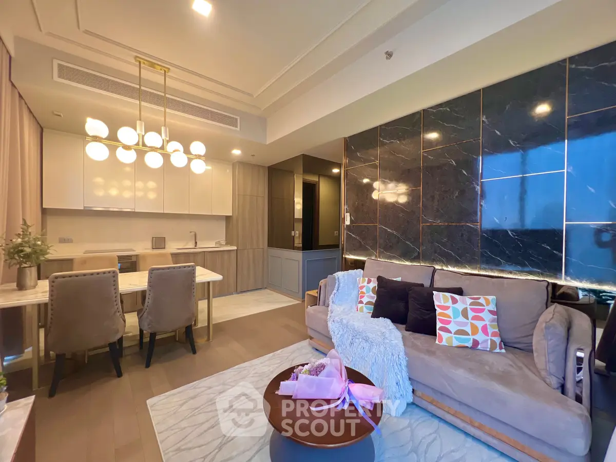 Luxurious modern living room with elegant decor and open kitchen layout