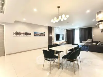 Spacious modern living room with elegant dining area and stylish lighting