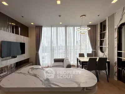 Luxurious modern living room with marble accents and elegant dining area, featuring floor-to-ceiling windows.