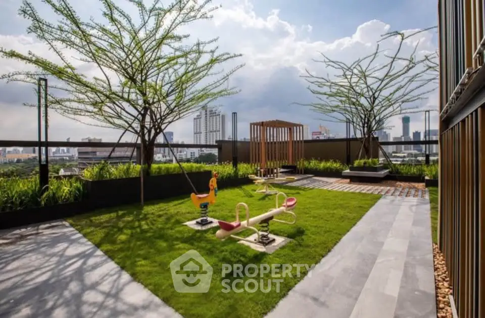 Stunning rooftop garden with city views and play area, perfect for relaxation and family fun.