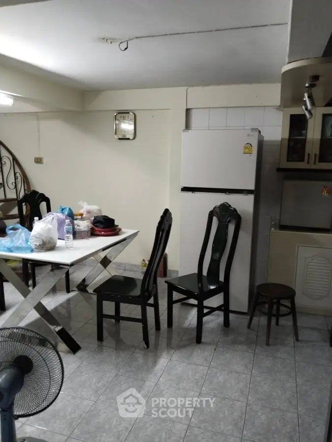Cozy kitchen with dining area and modern appliances