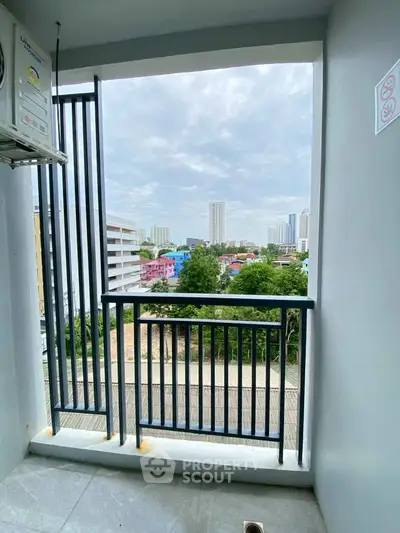 Stunning cityscape view from a modern apartment balcony, perfect for urban living.