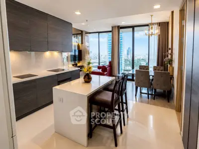 Luxurious open-plan kitchen and living area with stunning city views, modern furnishings, and elegant dining space.