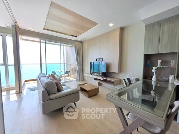 Modern living room with ocean view and stylish furniture