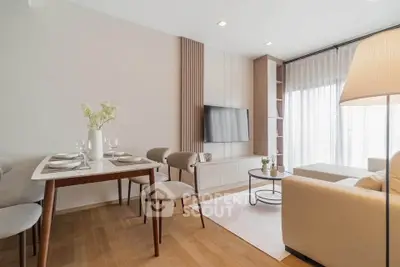 Modern living room with elegant dining area and natural light