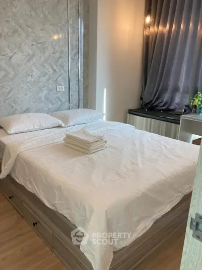 Cozy bedroom with modern decor and natural light