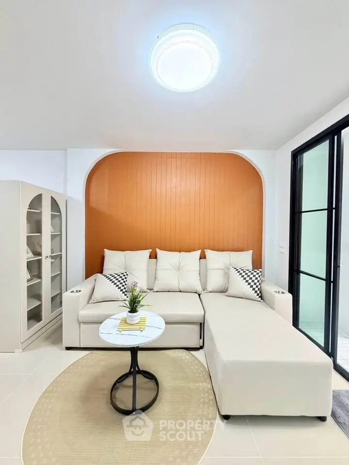 Modern living room with stylish sectional sofa and chic decor