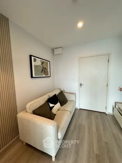 Cozy living room with modern decor and comfortable sofa