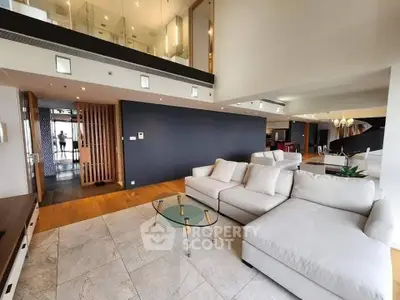 Spacious modern living room with elegant decor and open layout, perfect for luxury living.