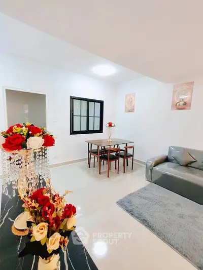 Elegant living room with modern decor and cozy seating area