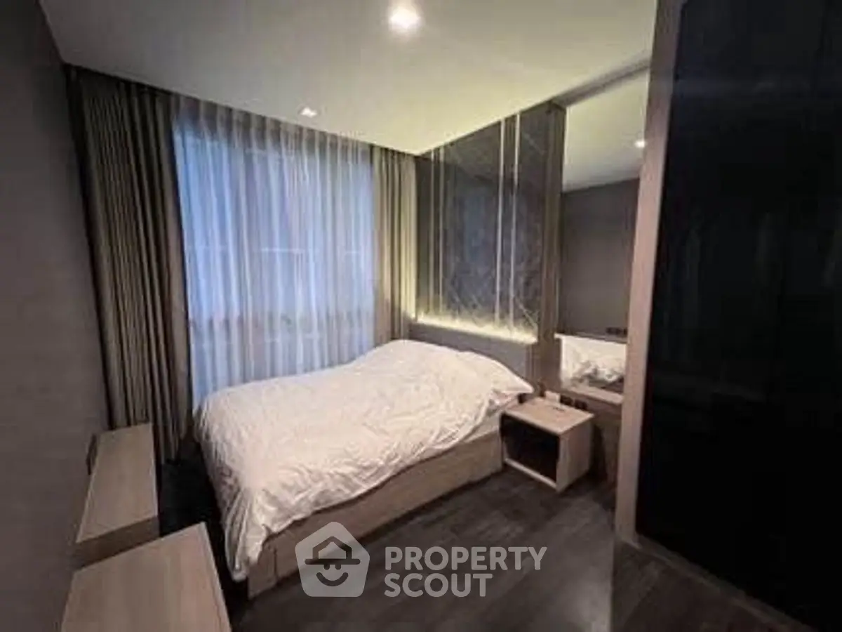 Modern bedroom with elegant decor and ambient lighting