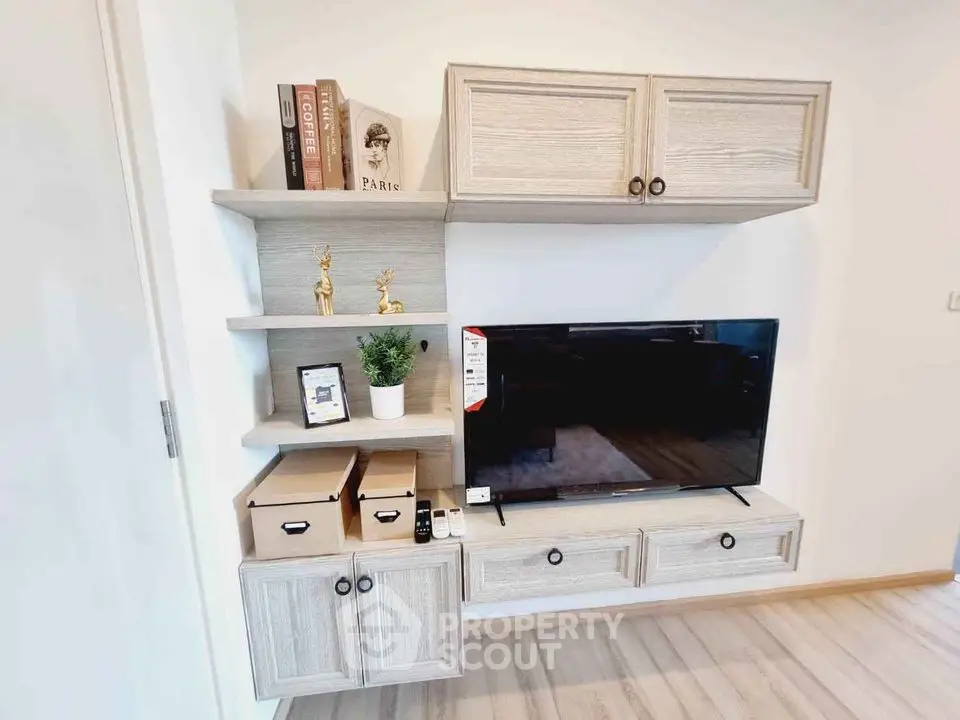 Modern living room with stylish TV cabinet and shelving unit