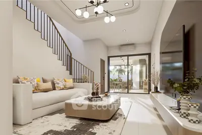 Modern living room with stylish decor and open layout, featuring a cozy sofa and elegant staircase.