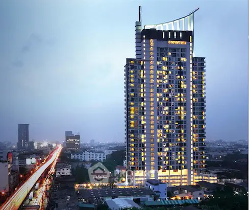 Stunning high-rise building with cityscape view, perfect for urban living enthusiasts.