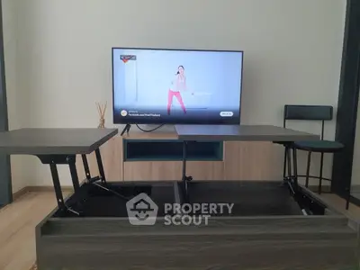 Modern living room with multifunctional furniture and wall-mounted TV