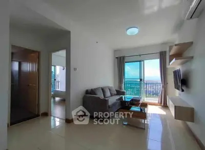 Modern living room with balcony view and sleek furniture