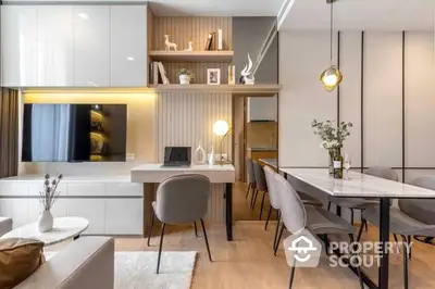 Chic modern apartment interior with open-plan living space, sleek furniture, and tasteful decor, perfect for urban lifestyles.