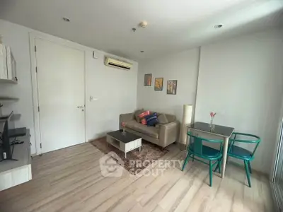 Modern living room with cozy sofa and dining area in bright apartment