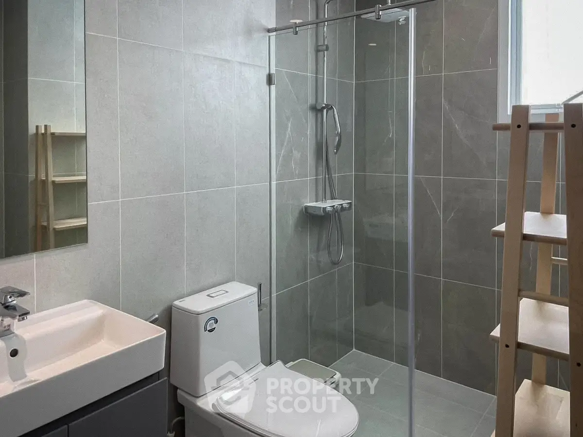 Modern bathroom with sleek shower and contemporary fixtures