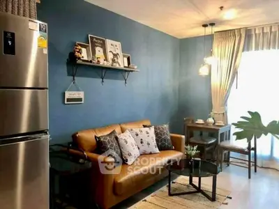 Charming living room with cozy sofa, stylish decor, and dining area in modern apartment.