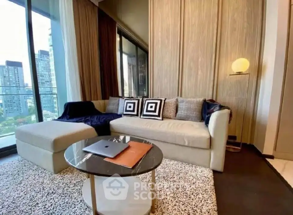 Modern living room with stylish sofa and city view balcony in luxury apartment