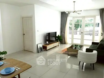 Spacious modern living room with elegant decor and natural light