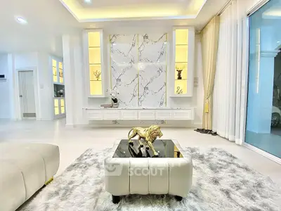 Luxurious modern living room with marble accents and elegant decor