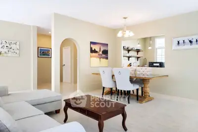 Elegant living room with dining area and stylish decor in modern home