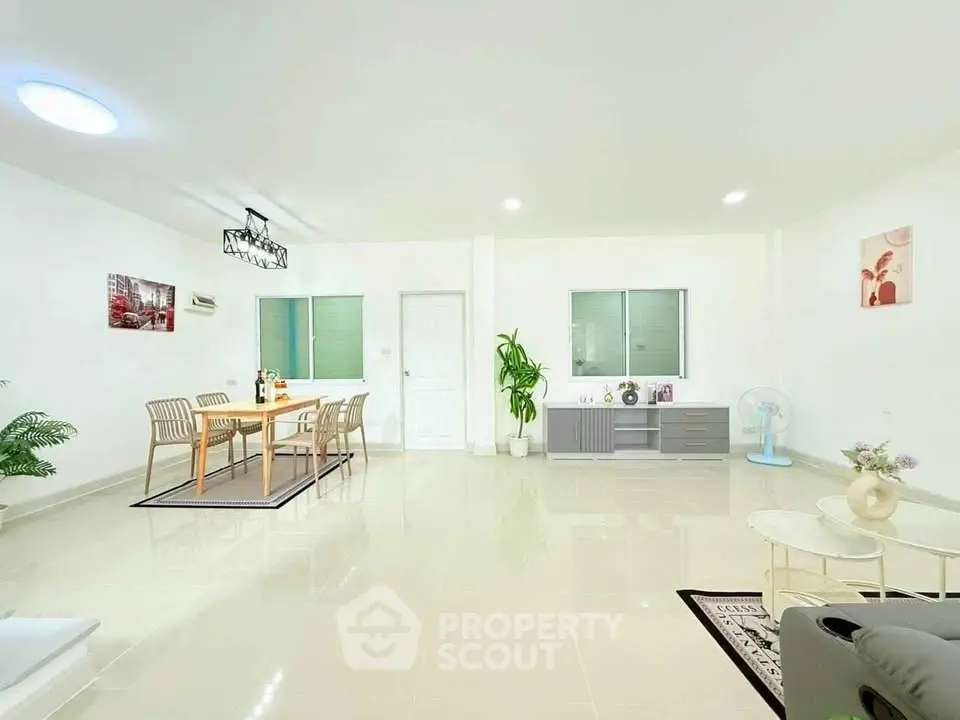 Spacious modern living room with dining area and elegant decor