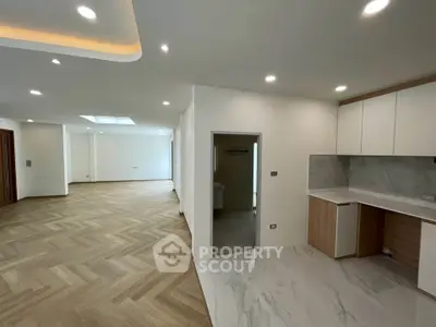 Spacious modern apartment with open layout and elegant flooring