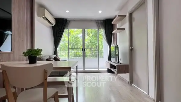 Modern living room with balcony view and stylish furniture