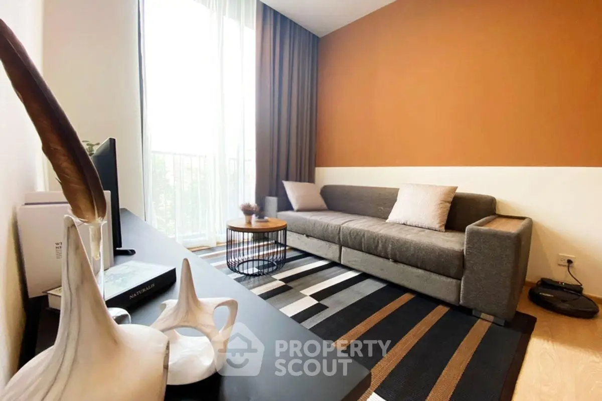 Stylish modern living room with cozy sofa and elegant decor