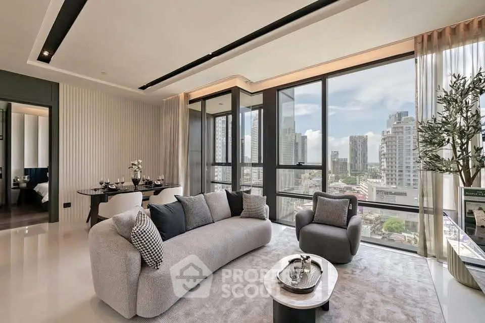 Luxurious modern living room with panoramic city views and elegant furnishings.
