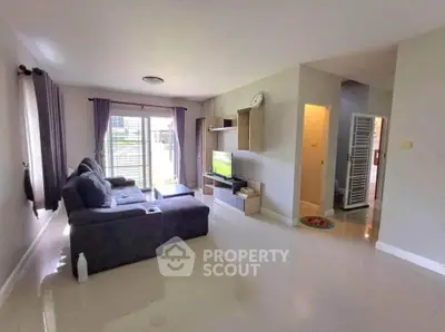 Spacious living room with modern furniture and natural light