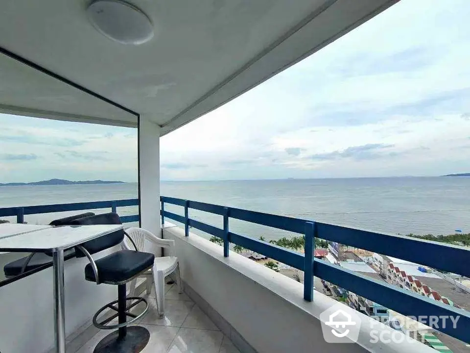 Stunning ocean view from spacious balcony in modern high-rise apartment