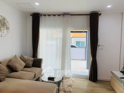 Cozy living room with modern decor and natural light
