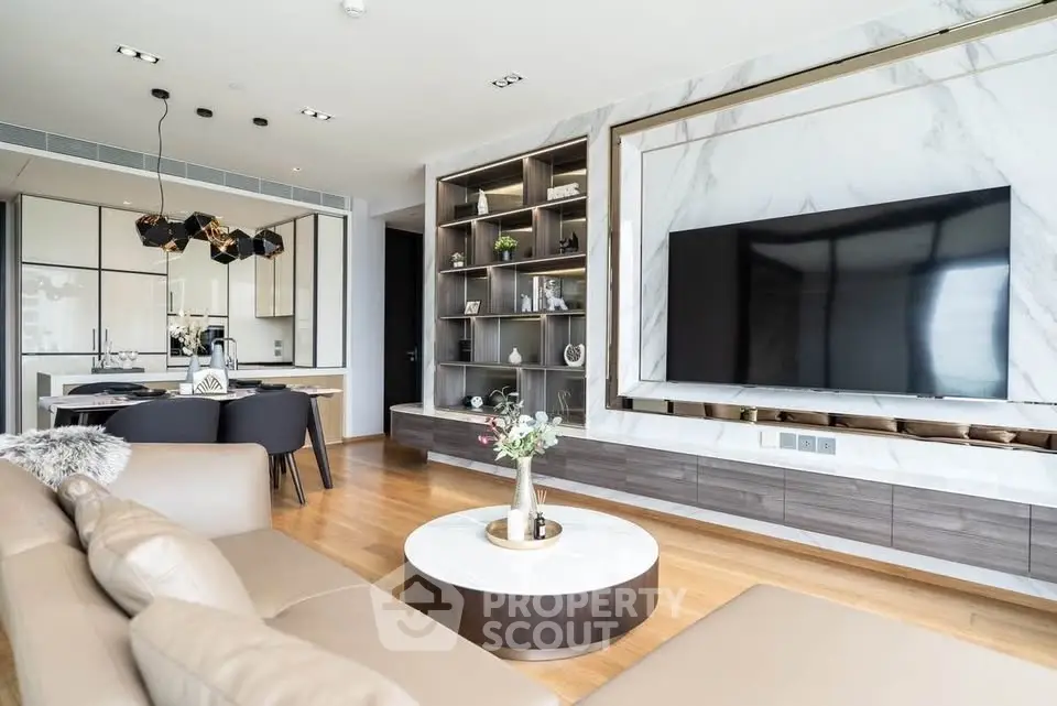 Luxurious modern living room with elegant decor and large TV