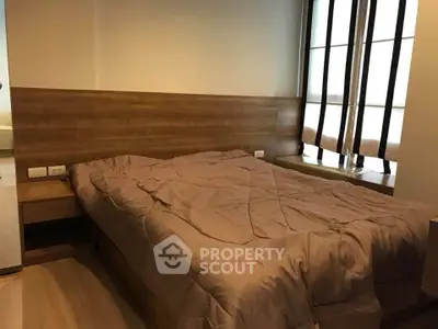 Cozy bedroom with wooden accents and natural light