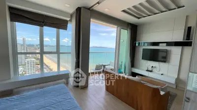 Luxurious beachfront apartment with stunning ocean view and modern interior design.
