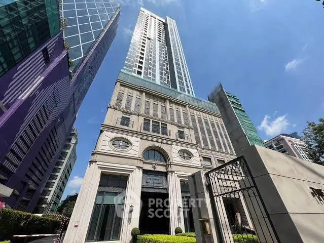 Stunning high-rise building with modern architecture and clear blue sky backdrop.