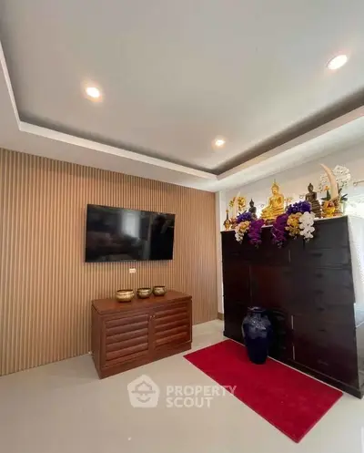 Modern living room with elegant decor and built-in TV unit