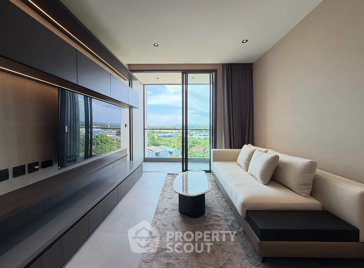 Modern living room with sleek design and stunning balcony view