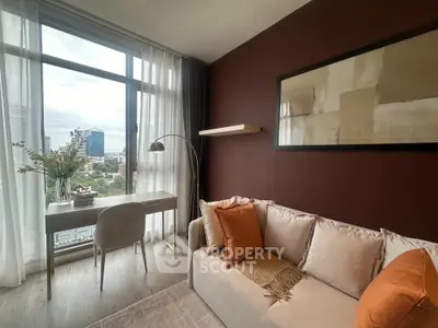 Modern living room with city view, stylish decor, and natural light
